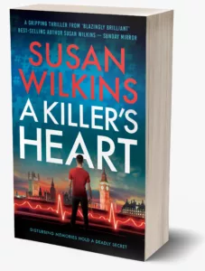 Image of Male figure viewing London in the distance . Cover for A Killer's Heart